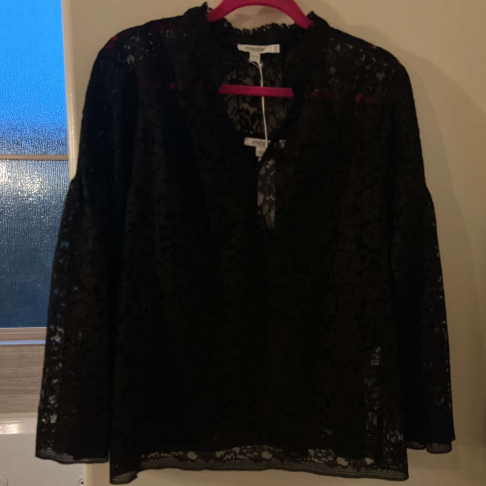 Beautiful Chico’s lace blouse. Unfortunately is too big for me.